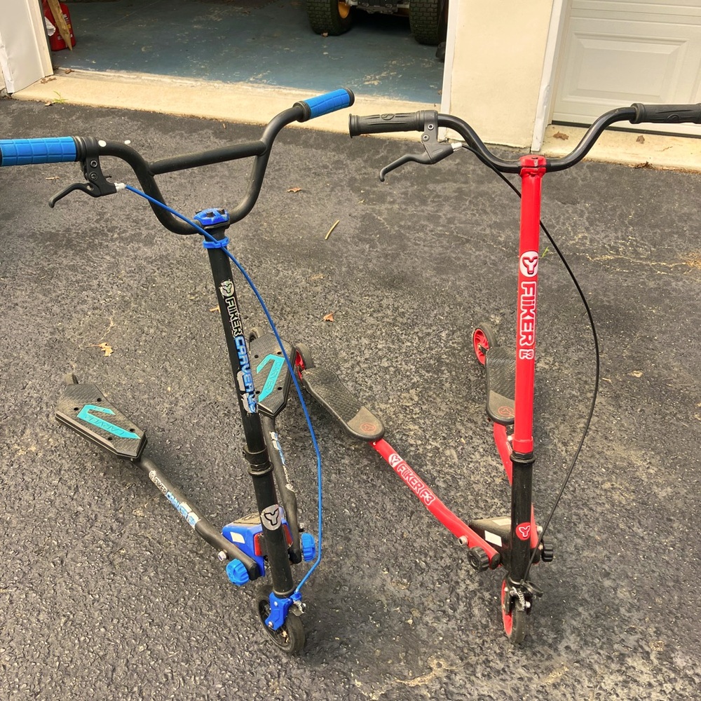2 Flicker Scooters, one red-one blue. 2 for $70, kids would love the scooters